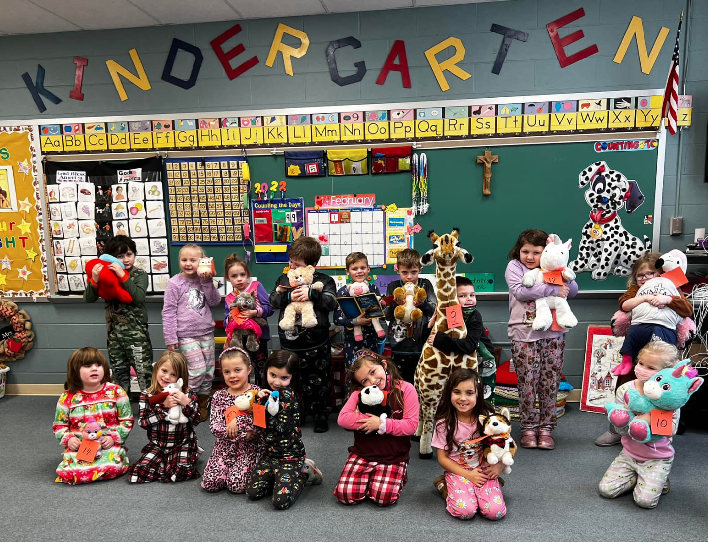 Kindergarten kids with teddy bears